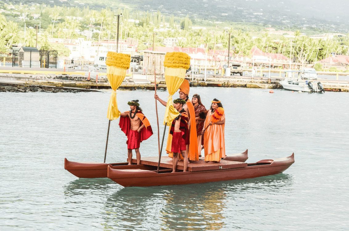 The Royal Court aboard an outrigger canoe on Kailua Bay